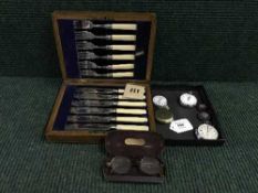 An oak canteen of plated fish cutlery, box of two pocket watches, two stopwatches,