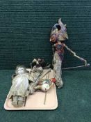 A tray of two wooden headed marionettes and a bisque headed doll