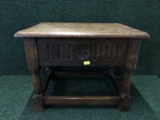 An early twentieth century joined oak storage table