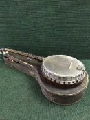 A Banjo Tenor with four strings by Windsor of Birmingham circa 1920,