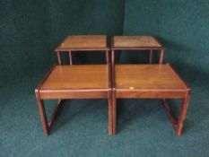 Two pairs of teak lamp tables