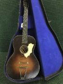 A six string guitar circa 1950 with original case