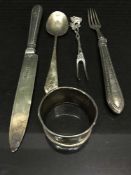 A silver knife and fork, silver pickle fork,
