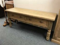 A reclaimed pine two drawer hall table