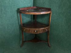 A late 19th century mahogany corner wash stand