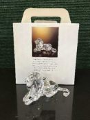 A boxed Swarvoski ornament of a lion