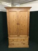 A pine double door wardrobe