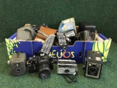 A box of cameras, Miranda, Brownie, Zenit etc.
