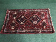A pine kitchen table and four chairs