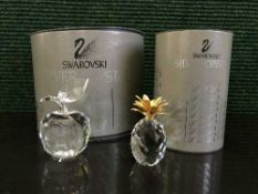 Two boxed Swarvoski ornaments - apple and pineapple