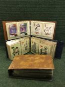 Three albums of Royal Mail first day covers and stamp postcards