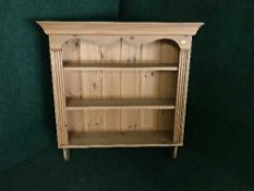 A pine kitchen wall rack