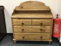 A Victorian pine four drawer chest