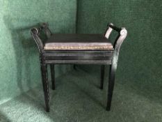 An Edwardian piano stool