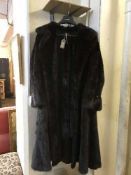 An excellent quality full-length mink lady's coat, size 14/16, with belt.