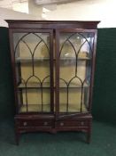 A Victorian mahogany glazed door display cabinet