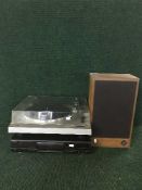 A JVC turntable together with a Technics cd player and pair of teak cased AR speakers