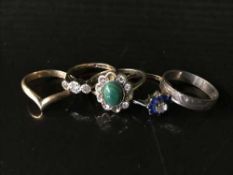 A 9ct gold three stone ring,