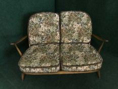 A three piece Ercol lounge suite