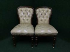 A pair of Victorian mahogany upholstered bedroom chairs