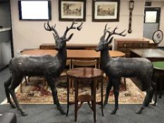 An impressive pair of bronze stag figures, height 156 cm.