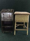 A brass magazine rack together with a wicker sewing box