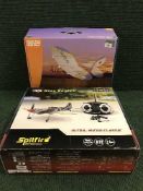 A nine eagle remote controlled spitfire together with a remote controlled Might Vapour and a remote