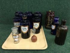 A tray of assorted chemist's bottles
