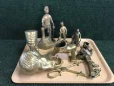 A tray of brass miners figures, brass boots,