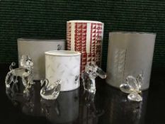 Four boxed Swarvoski ornaments - poodle, donkey ,