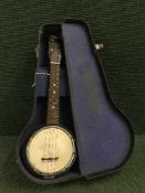 A banjo ukelele JET made for Jerome Thibonville, Lamy France, circa 1920, in original case.