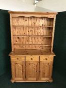 A pine triple door kitchen dresser
