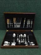 A mahogany canteen of cutlery
