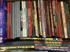 A box of annuals including Dandy, Beano,
