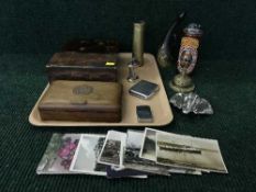 A tray of wooden table boxes, Newcastle Brown Ale lighter, hunting horn,