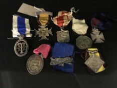 A box of seven nineteenth and early twentieth century temperance medals, some parts silver.