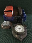 A box of oak shield barometer, circular barometer, binoculars, cameras etc.