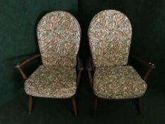 A pair of Ercol high back armchairs