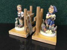 A pair of Hummel figure bookends