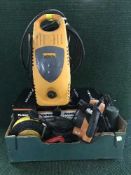 A box of power tools, extension leads, three fan heaters, hedge trimmer,