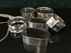 Six miscellaneous silver napkin rings