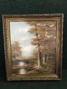 A gilt framed oil on canvas - woodland scene signed Shiller