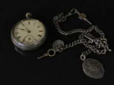 A silver cased pocket watch on chain with silver albert and coin