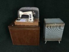 A teak storage cabinet,