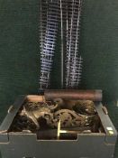 A box of brass trivets, brass ornaments, brass planters, copper canisters, train track,