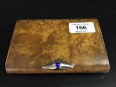 A Russian pine cigar box with gold clasp,