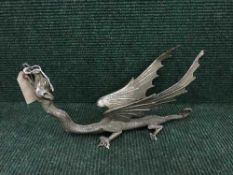 A metal figure of a dragon