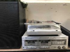 A Sharp automatic stereo turntable together with a double tape deck,