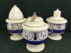 Three pottery lidded Chemist's dispensers (two with lids) - Olivar.