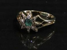 A vintage emerald and rose diamond ring set in 18ct gold